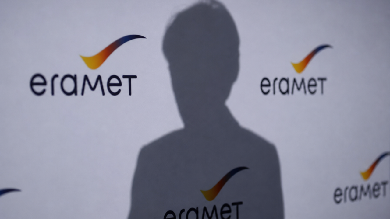 Eramet logo backdrop and silhouette