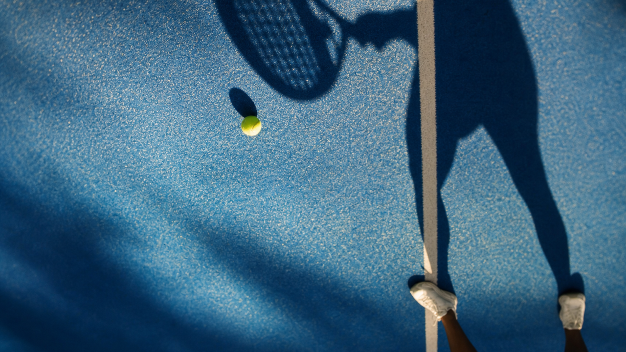 Padel court with ball and shadows
